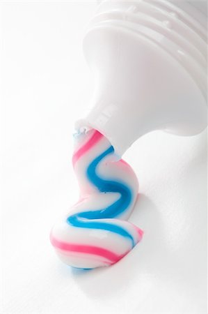 Blue red and white striped toothpaste squeezed from a tube. Stock Photo - Budget Royalty-Free & Subscription, Code: 400-04818822