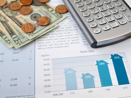 stock quote - Money and calculator on the home sales chart Photographie de stock - Aubaine LD & Abonnement, Code: 400-04818835