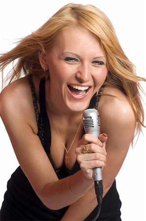 Young beautiful blond girl singing isolated on white Stockbilder - Microstock & Abonnement, Bildnummer: 400-04819088