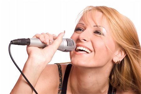 Young beautiful blond girl singing isolated on white Stock Photo - Budget Royalty-Free & Subscription, Code: 400-04819089