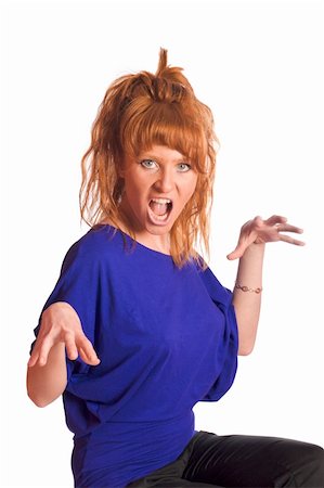 Shocked furious redhead woman isolated on white Stock Photo - Budget Royalty-Free & Subscription, Code: 400-04819080