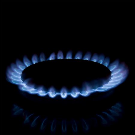 Full focus of Gas burner isolated on black background Stock Photo - Budget Royalty-Free & Subscription, Code: 400-04819458