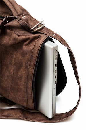 modern laptop in a bag on a white background Stock Photo - Budget Royalty-Free & Subscription, Code: 400-04819491