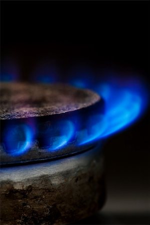 simsearch:400-07954568,k - Gas burning by a dark blue flame on  kitchen Stock Photo - Budget Royalty-Free & Subscription, Code: 400-04819555