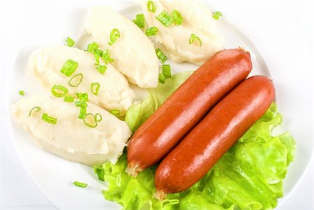 Cutlets from potato and sausage at green lettuce and green onion Stock Photo - Budget Royalty-Free & Subscription, Code: 400-04810012