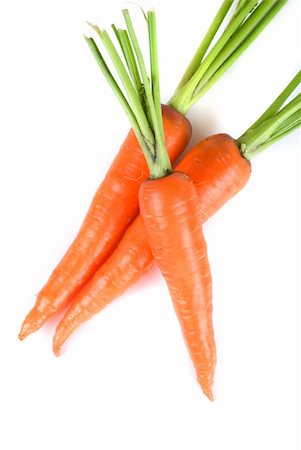simsearch:400-04812261,k - Ripe carrots isolated on a white background Photographie de stock - Aubaine LD & Abonnement, Code: 400-04810028