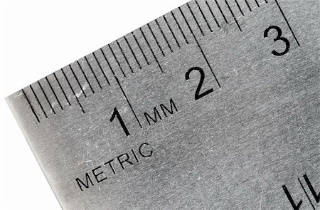 Macro shot of an industrial stainless steel ruler, metric side. Foto de stock - Super Valor sin royalties y Suscripción, Código: 400-04811204