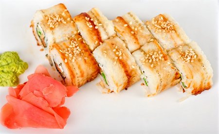 simsearch:400-05119569,k - Sushi rolls at plate isolated on a white Stock Photo - Budget Royalty-Free & Subscription, Code: 400-04811245
