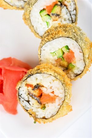 simsearch:400-05119569,k - Sushi rolls at plate isolated on a white Stockbilder - Microstock & Abonnement, Bildnummer: 400-04811250