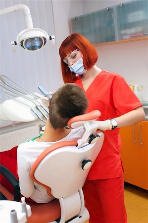 simsearch:400-04309650,k - Image of young lady with dentist over her checking oral cavity Stock Photo - Budget Royalty-Free & Subscription, Code: 400-04811330