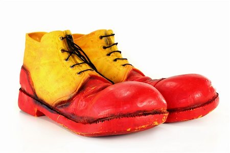 silencefoto (artist) - red yellow clown shoes on a white background Stockbilder - Microstock & Abonnement, Bildnummer: 400-04811435