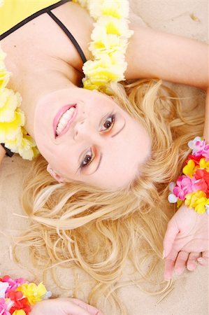simsearch:400-05665630,k - Beautiful woman relax in hawaii style suit Stock Photo - Budget Royalty-Free & Subscription, Code: 400-04811812