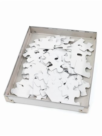 simsearch:400-05288074,k - Jigsaw puzzle pieces isolated against a white background Stock Photo - Budget Royalty-Free & Subscription, Code: 400-04812308