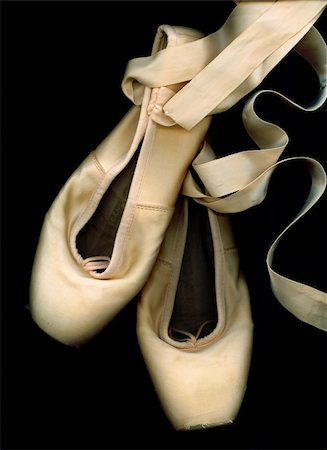 simsearch:400-07660010,k - Worn ballet en pointe shoes on black. Stock Photo - Budget Royalty-Free & Subscription, Code: 400-04812705