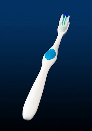 toothbrush on background Stock Photo - Budget Royalty-Free & Subscription, Code: 400-04812748