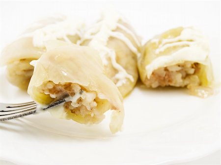 On a plug the piece of a stuffed cabbage with rice is strung Stockbilder - Microstock & Abonnement, Bildnummer: 400-04812798