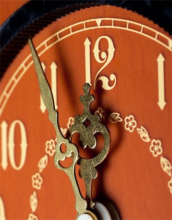 Closeup view of antique clock face. Last minutes before midnight. Stock Photo - Budget Royalty-Free & Subscription, Code: 400-04812862