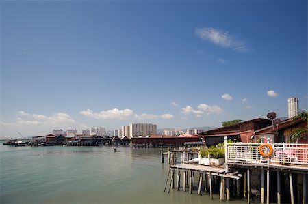 simsearch:400-06078495,k - Pier near modern city with boat dwellers in Penang, Malaysia, Asia. Foto de stock - Super Valor sin royalties y Suscripción, Código: 400-04812872