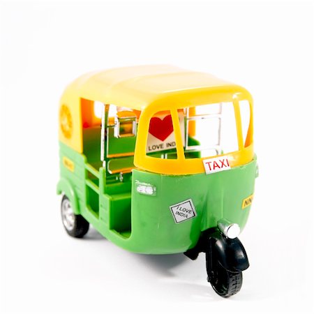 Plastic tuk-tuk from India, with sticker "I LOVE INDIA". Stock Photo - Budget Royalty-Free & Subscription, Code: 400-04812915