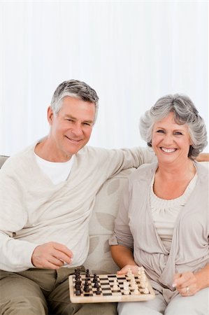 simsearch:400-04311095,k - Senior couple looking at the camera at home Stock Photo - Budget Royalty-Free & Subscription, Code: 400-04813135