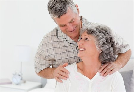 simsearch:400-04311095,k - Retired man giving a massage to his wife at home Stock Photo - Budget Royalty-Free & Subscription, Code: 400-04813214