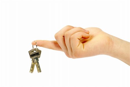 simsearch:400-04663994,k - hand holds a key isolated on white Photographie de stock - Aubaine LD & Abonnement, Code: 400-04813211