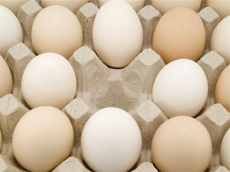 Eggs are in cells and one cell without egg Stockbilder - Microstock & Abonnement, Bildnummer: 400-04813256