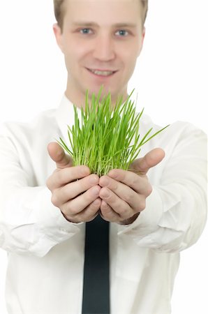 simsearch:400-04385133,k - man holding a small plant in the studio isolated Stock Photo - Budget Royalty-Free & Subscription, Code: 400-04813684