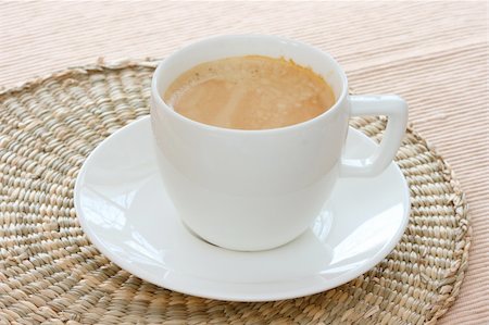 Close up view of white cup of espresso coffee Stock Photo - Budget Royalty-Free & Subscription, Code: 400-04813723