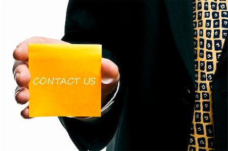 simsearch:400-07172957,k - Business man with "Contact Us"  sticker in hand Photographie de stock - Aubaine LD & Abonnement, Code: 400-04813970