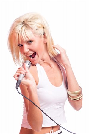 Young beautiful blond girl singing isolated on white Stock Photo - Budget Royalty-Free & Subscription, Code: 400-04824108