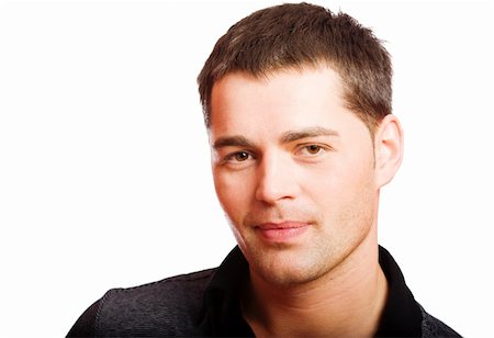 Smiling Young man's face close up isolated Stockbilder - Microstock & Abonnement, Bildnummer: 400-04824140