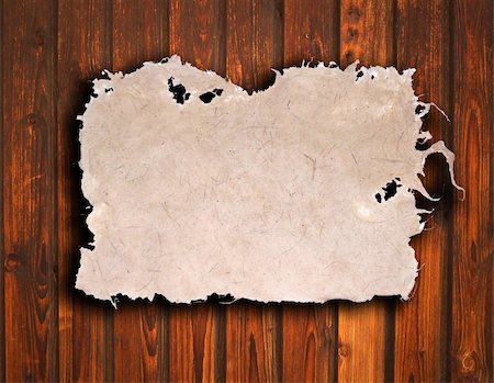scrolled up paper - old paper on brown wood texture with natural patterns Stock Photo - Budget Royalty-Free & Subscription, Code: 400-04824299