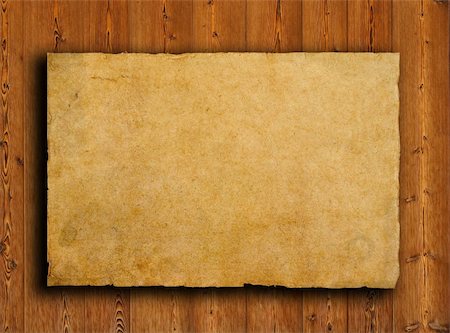 scrolled up paper - old paper on brown wood texture with natural patterns Stock Photo - Budget Royalty-Free & Subscription, Code: 400-04824301