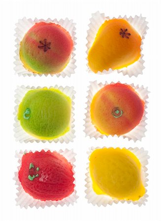 Colorful Marzipan in Fruit Shapes in Wrappers Isolated on White with a Clipping Path. Stock Photo - Budget Royalty-Free & Subscription, Code: 400-04824686