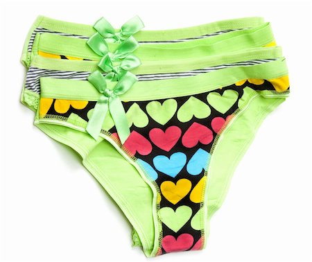simsearch:400-05298095,k - Four green feminine panties with pattern in the manner of heart on white background Photographie de stock - Aubaine LD & Abonnement, Code: 400-04824797