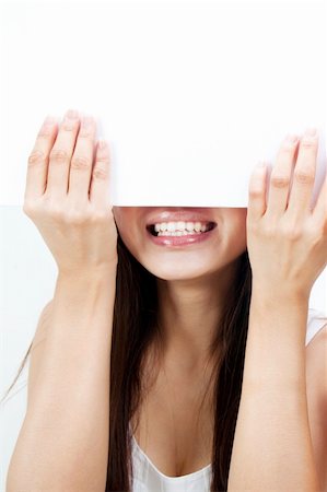 simsearch:400-05718227,k - Concept photo of Asian woman holding a white card, covering her eyes. Stock Photo - Budget Royalty-Free & Subscription, Code: 400-04824998