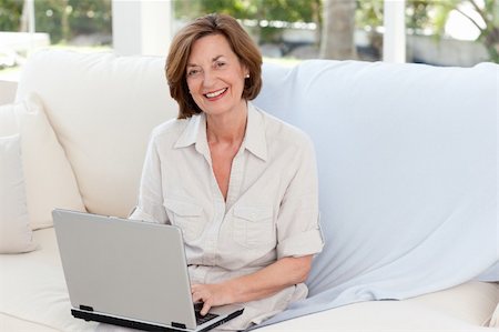 Senior working on her laptop Stock Photo - Budget Royalty-Free & Subscription, Code: 400-04825003