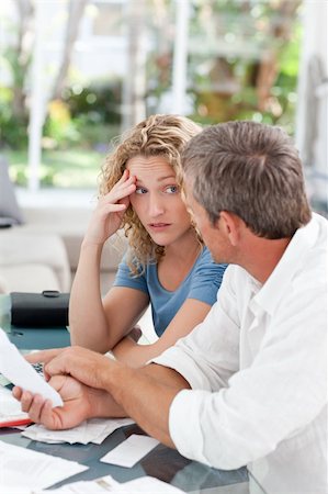 simsearch:400-05746763,k - Desperate couple calculating their domestic bills at home Stock Photo - Budget Royalty-Free & Subscription, Code: 400-04825124