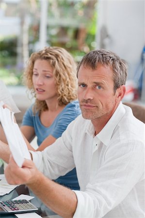 simsearch:400-05746763,k - Desperate couple calculating their domestic bills at home Stock Photo - Budget Royalty-Free & Subscription, Code: 400-04825125