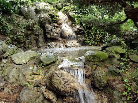 Picture of small waterfall in summer garden Photographie de stock - Aubaine LD & Abonnement, Code: 400-04829412