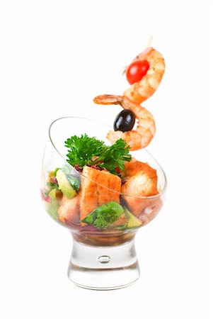 shashlik - Fried kebab of shrimps with vegetables, greens and salmon fish Stock Photo - Budget Royalty-Free & Subscription, Code: 400-04829492