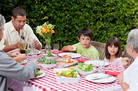 family cheese - Happy family eating in the garden Stock Photo - Budget Royalty-Free & Subscription, Code: 400-04829804