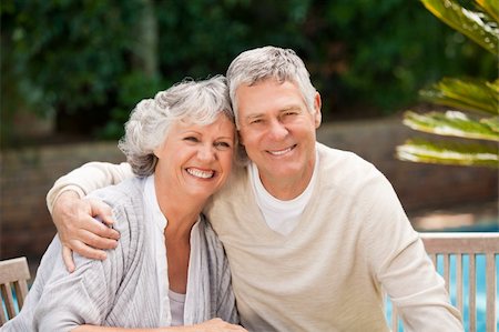 Senior couple hugging in the garden Stock Photo - Budget Royalty-Free & Subscription, Code: 400-04829823