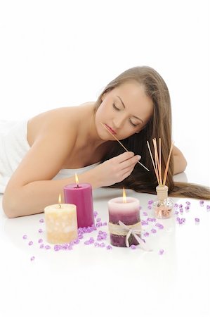 Aromatherapy.Beautiful woman with pure healthy skin and long hair in spa salon relaxing. isolated on white background Stock Photo - Budget Royalty-Free & Subscription, Code: 400-04829834