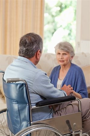 Senior couple talking in the living room at home Stock Photo - Budget Royalty-Free & Subscription, Code: 400-04829904