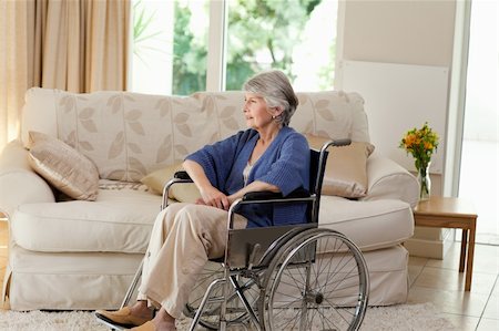 Retired woman in her wheelchair at home Stock Photo - Budget Royalty-Free & Subscription, Code: 400-04829994