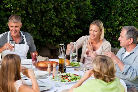 family cheese - Lovely family eating in the garden Stock Photo - Budget Royalty-Free & Subscription, Code: 400-04829999