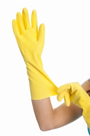 rubber hand gloves - Close-up on female hands wearing protective rubber gloves. Isolated on white Stock Photo - Budget Royalty-Free & Subscription, Code: 400-04820121