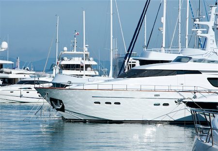 A selection of luxury yachts in the marina at Gibraltars Ocean Village Stock Photo - Budget Royalty-Free & Subscription, Code: 400-04822082